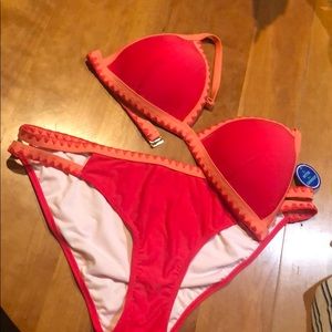 Swimsuit NWT top is size 14 bottoms are size 18